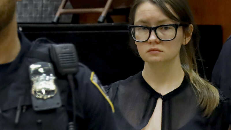 Anna Sorokin in black at courthouse