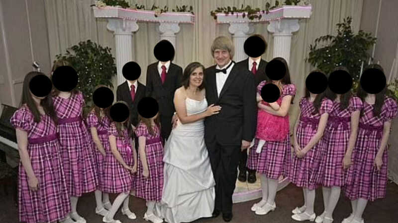 Turpin Family, children in pink dresses standing by parents
