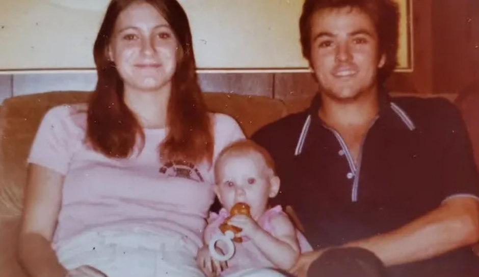 Holly Marie Clouse and parents sitting on couch
