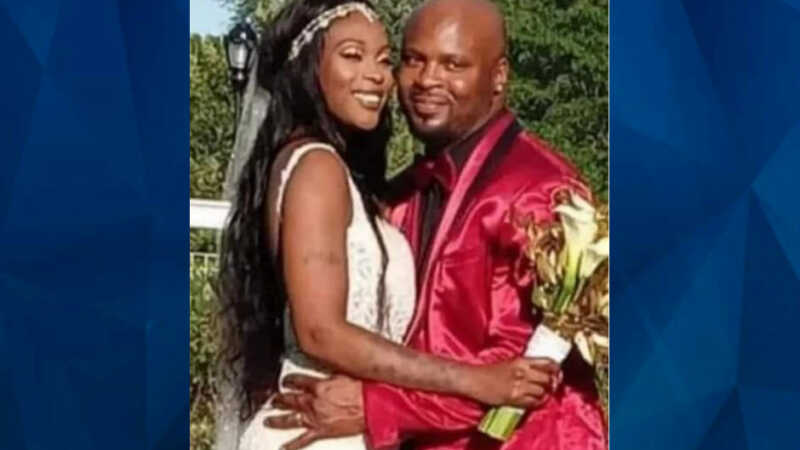 Keaira Hudson standing with husband