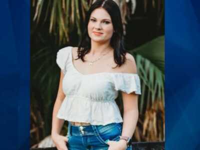 Anna Kepner in white blouse and jeans