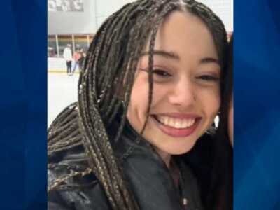 Hailey Buzbee in blakc jacket